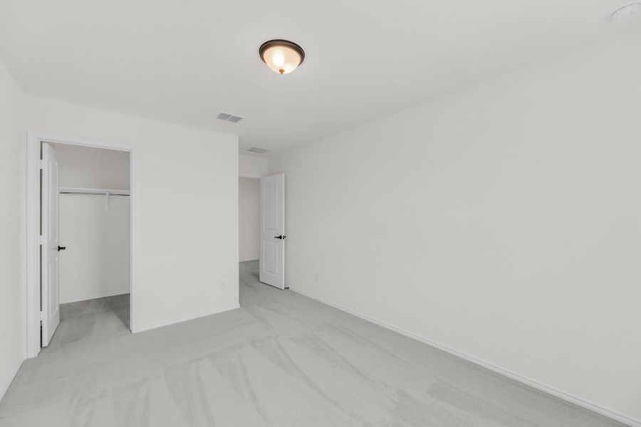 Spacious, unfurnished interior of a new home in Salerno - Classic Collection, Round Rock (Image 29). Spacious, unfurnished interior of a new home in Salerno - Classic Collection, Round Rock (Image 29).