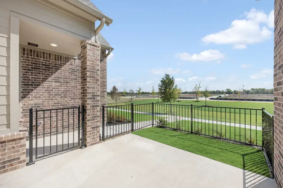 Exterior details and patio area of a home in Cottonwood Creek, Rowlett (Image 27). Exterior details and patio area of a home in Cottonwood Creek, Rowlett (Image 27).