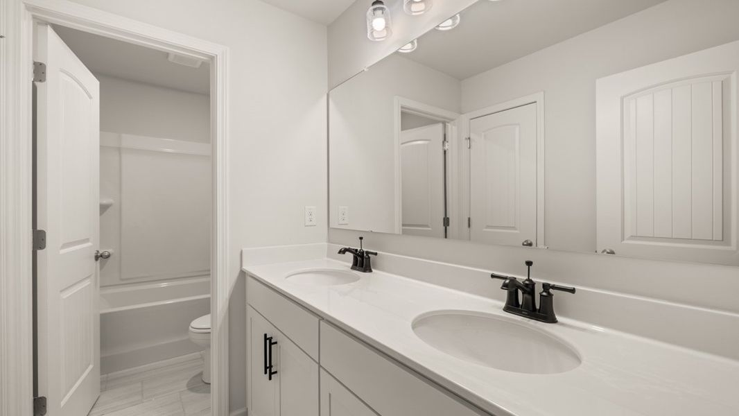 Representative furnished interior of a home built from the Bellview by D.R. Horton in Thalley Creek Estates, Cumming (Image 14).
