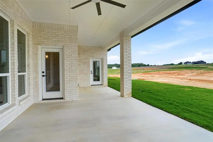 Exterior details and patio area of a home in , Springtown (Image 3).