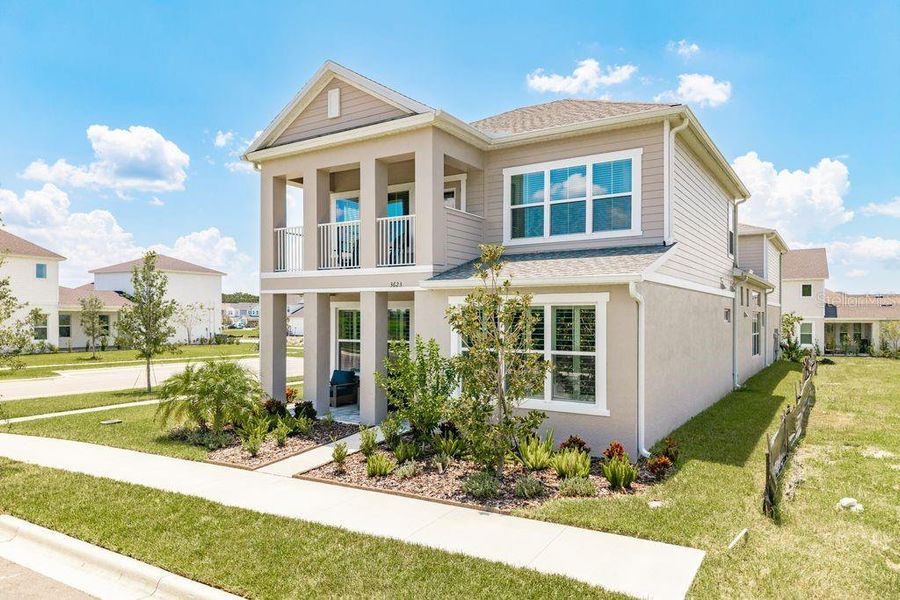 Front exterior of a new home in , Wesley Chapel, FL, highlighting curb appeal (Image 23).