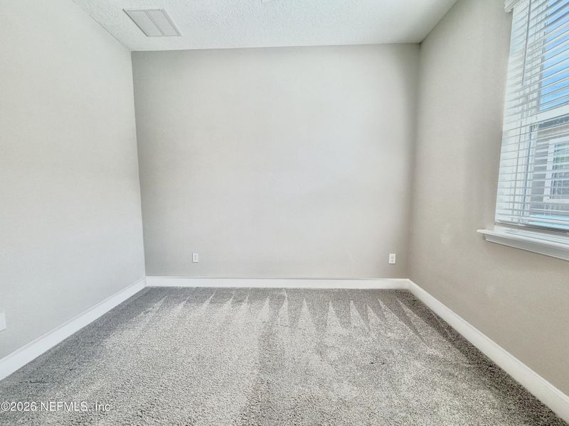 Spacious, unfurnished interior of a new home in Seasons at TrailMark, St. Augustine (Image 52).