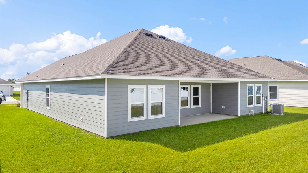 Front exterior of a new home in Liberty, Panama City, FL, highlighting curb appeal (Image 19).