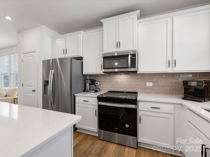 Furnished interior view inside a new home in Smith Farm, Belmont (Image 10).