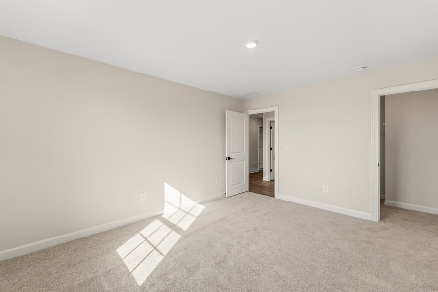 Spacious, unfurnished interior of a new home in Bens Crossing, Woodruff (Image 41).