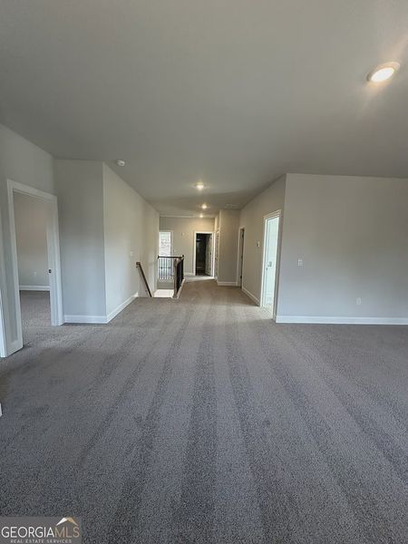 Spacious, unfurnished interior of a new home in Mirror Lake at South Harbour, Villa Rica (Image 18).