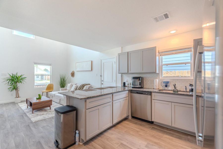 Beautiful kitchen offering extra prep space and casual dining Beautiful kitchen offering extra prep space and casual dining