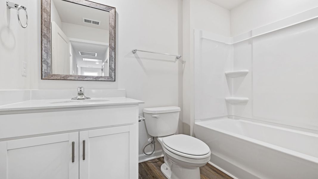 Furnished interior view inside a new home in Village Grove, Greenville (Image 8).