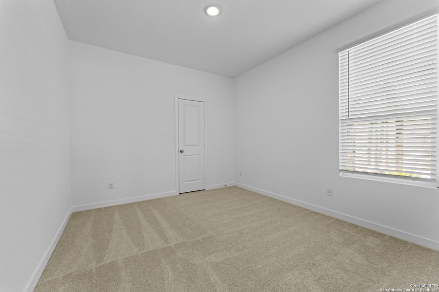 Spacious, unfurnished interior of a new home in Waterwheel: Coastline Collection, San Antonio (Image 6).