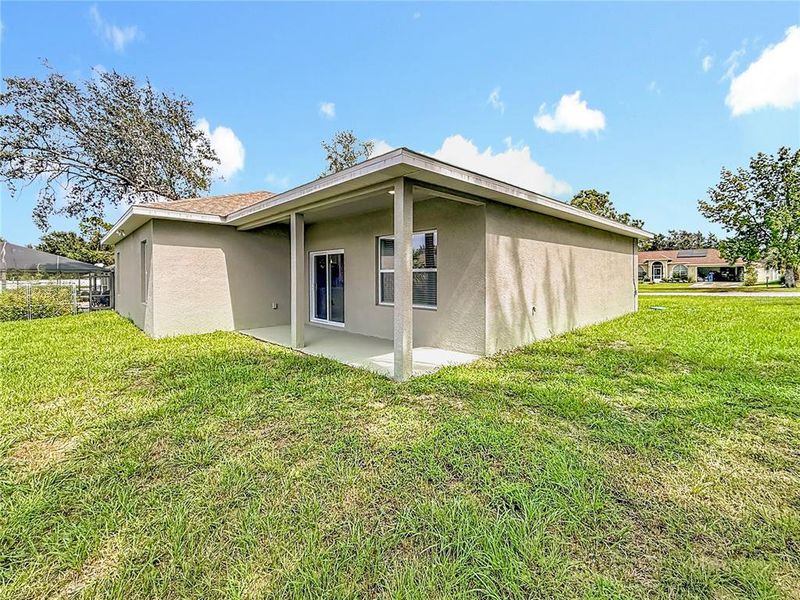 Exterior details and patio area of a home in , Ocala (Image 3).