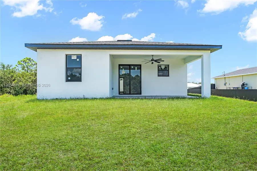 Exterior details and patio area of a home in , Lehigh Acres (Image 25). Exterior details and patio area of a home in , Lehigh Acres (Image 25).