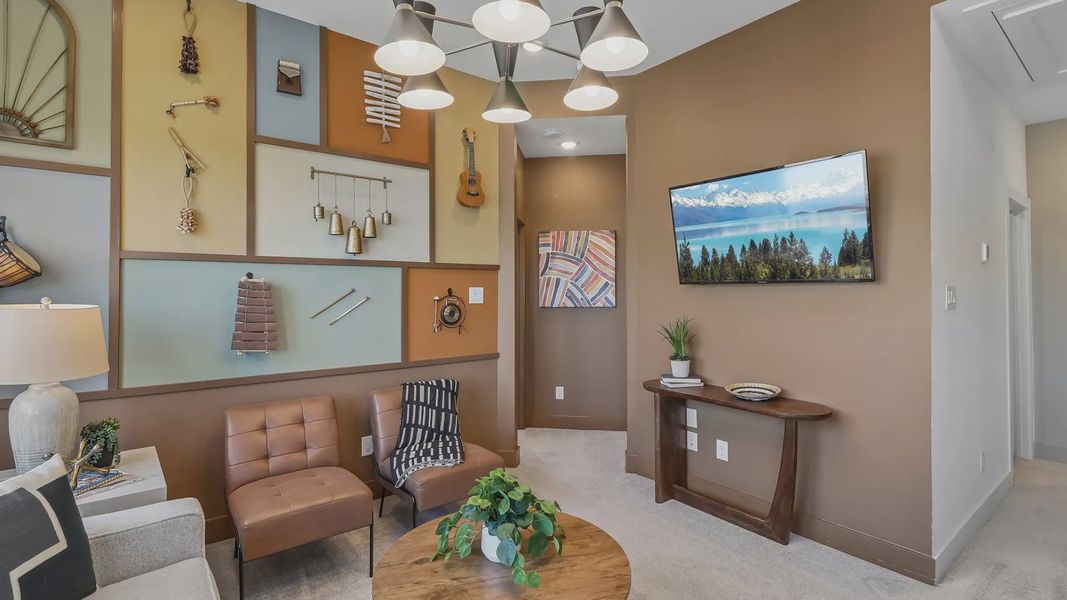 Furnished interior view inside a new home in Meridiana Chateau, Manvel (Image 10).