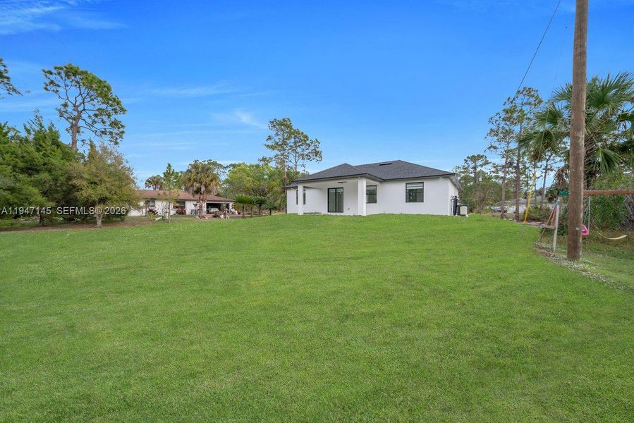 Exterior details and patio area of a home in , Lehigh Acres (Image 21).