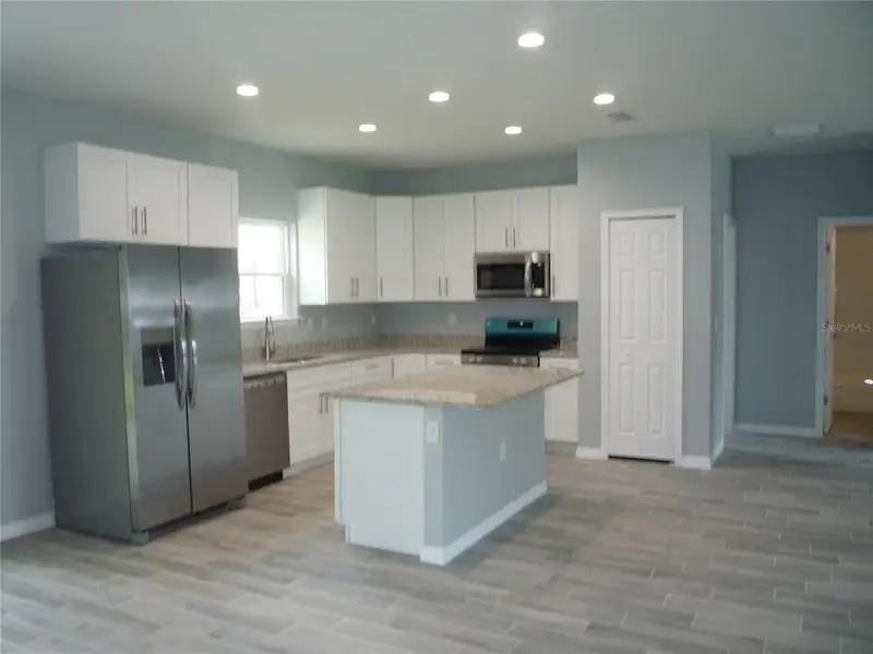 Furnished interior view inside a new home in , Ocala (Image 4).