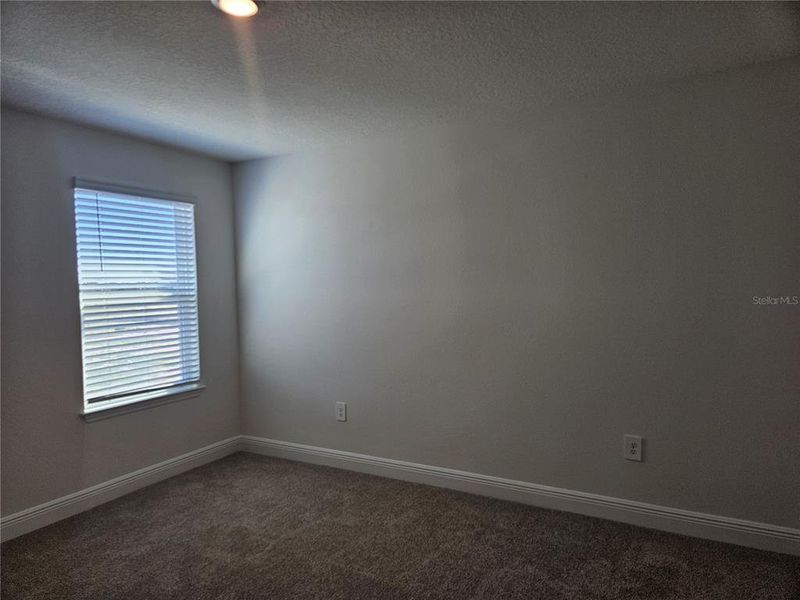 Spacious, unfurnished interior of a new home in The Reserve at Hammock Oaks - Classic Series, Lady Lake (Image 42).