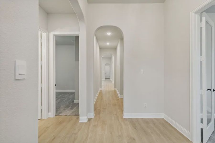 Representative unfurnished interior of a home built from the Logan by Cambridge Homes in Lake Park, Rowlett (Image 14).