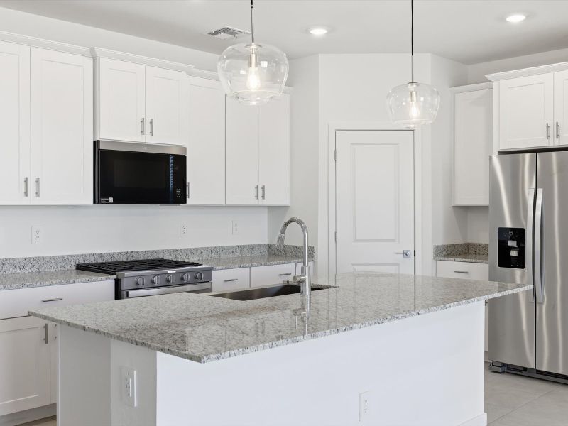 Furnished interior view inside a new home in Silva Farms - Estate Series, Goodyear (Image 4). Furnished interior view inside a new home in Silva Farms - Estate Series, Goodyear (Image 4).