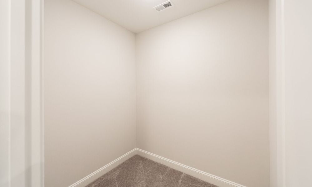 Representative unfurnished interior of a home built from the Coronado by Classica Homes in Weddington Grove, Weddington (Image 22).