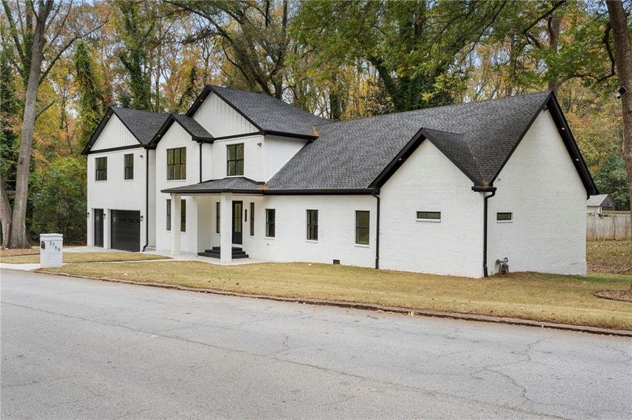 Front exterior of a new home in , Decatur, GA, highlighting curb appeal (Image 1). Front exterior of a new home in , Decatur, GA, highlighting curb appeal (Image 1).