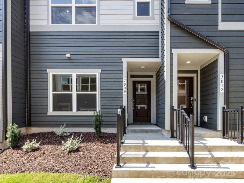 Front entry with covered entryway.