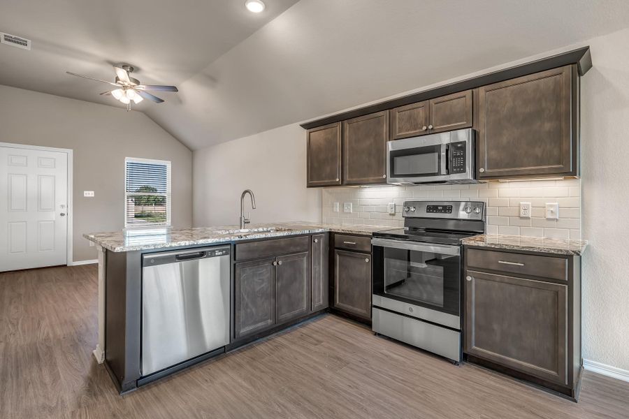**Photos are sample photos of similar plan. Colors and features might vary**