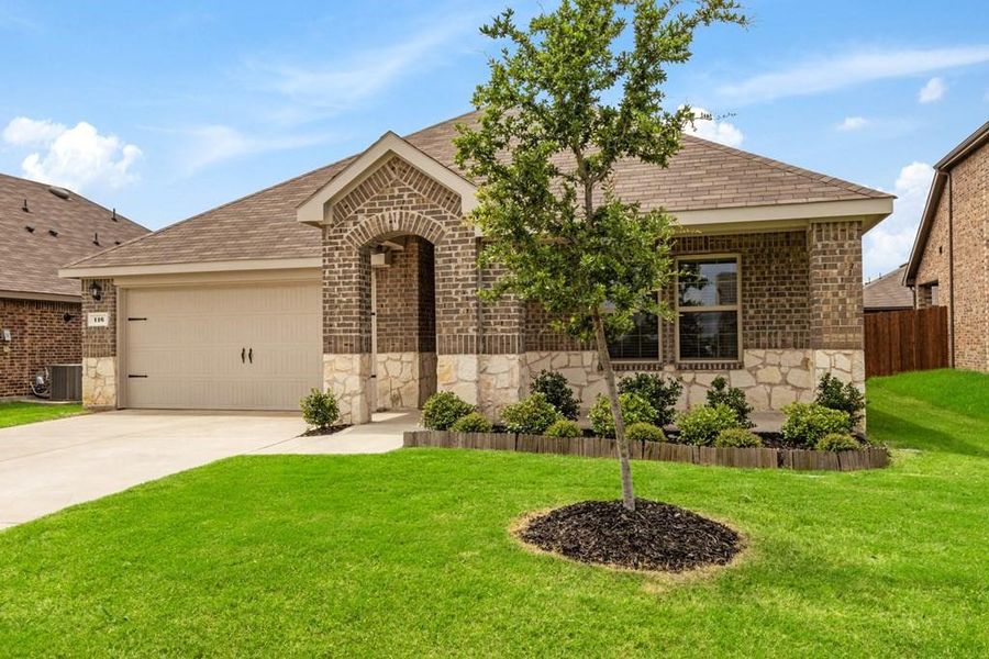Front exterior of a new home in , Caddo Mills, TX, highlighting curb appeal (Image 18). Front exterior of a new home in , Caddo Mills, TX, highlighting curb appeal (Image 18).