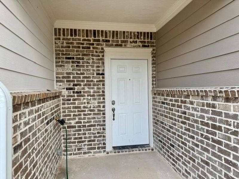 Exterior details and patio area of a home in Park Center Pointe, Mableton (Image 3).