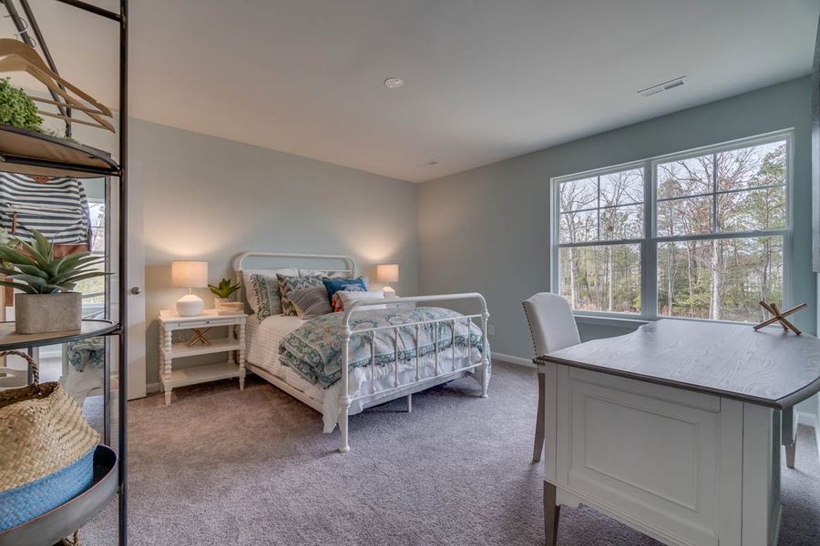 Representative furnished interior of a home built from the PENWELL by D.R. Horton in The Parks, White House (Image 12).