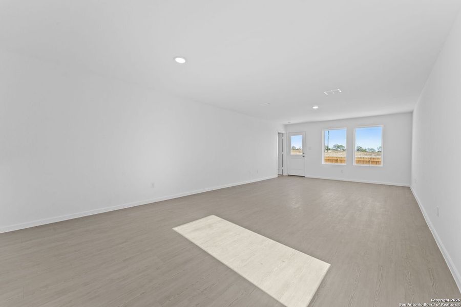 Spacious, unfurnished interior of a new home in Randolph Crossing: Cottage Collection, Converse (Image 9).