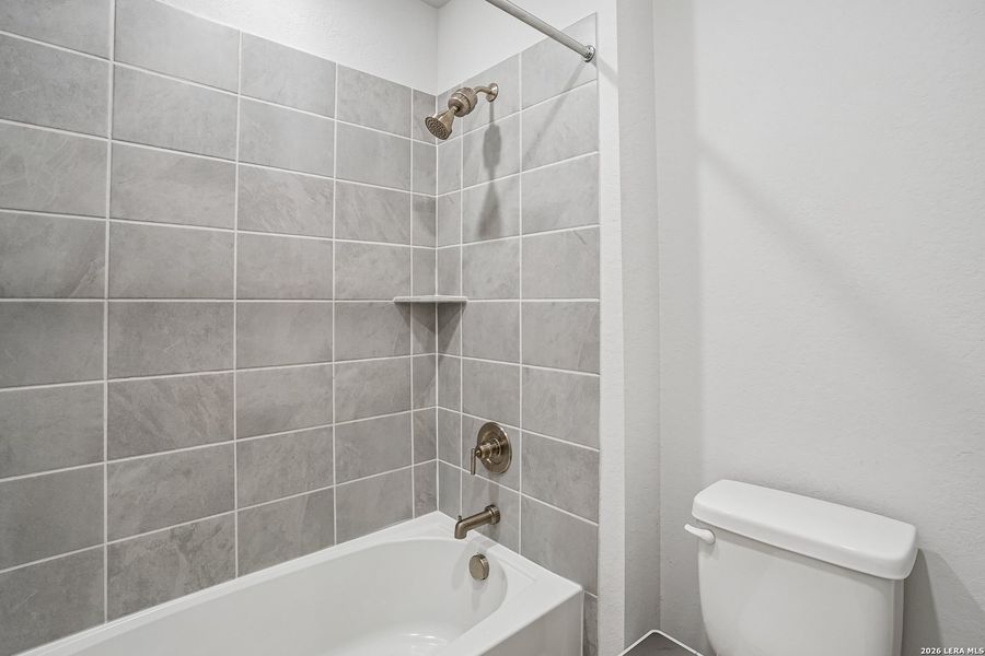 Furnished interior view inside a new home in University Village, San Antonio (Image 9).