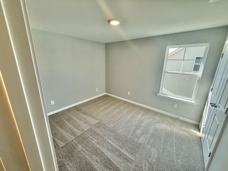 Spacious, unfurnished interior of a new home in Stonehenge, Manchester (Image 5).