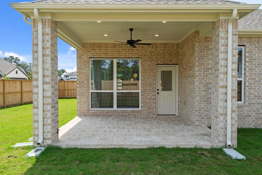 Exterior details and patio area of a home in Evergreen 40s, Conroe (Image 2). Exterior details and patio area of a home in Evergreen 40s, Conroe (Image 2).