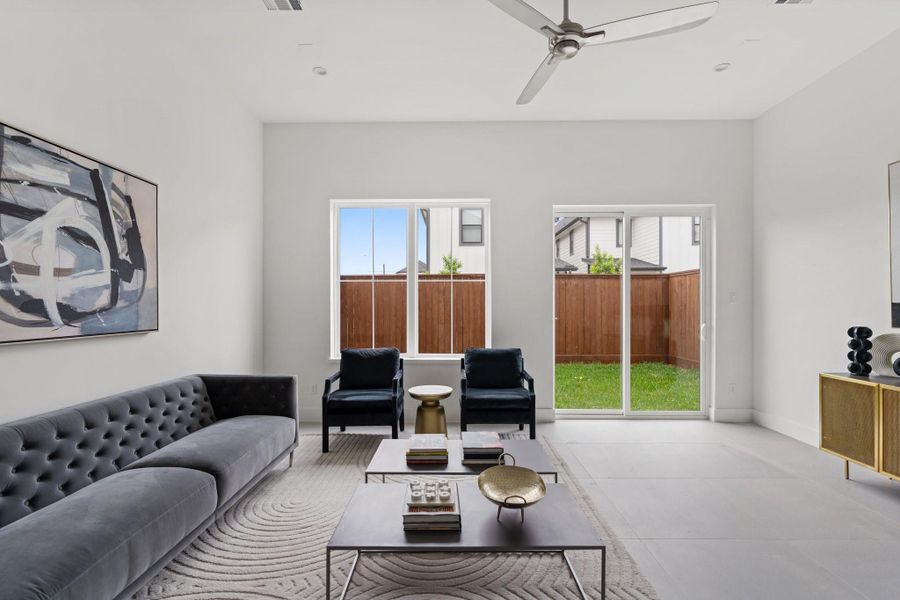 Premium designer tile flooring offers timeless elegance and effortless maintenance in the family room Premium designer tile flooring offers timeless elegance and effortless maintenance in the family room