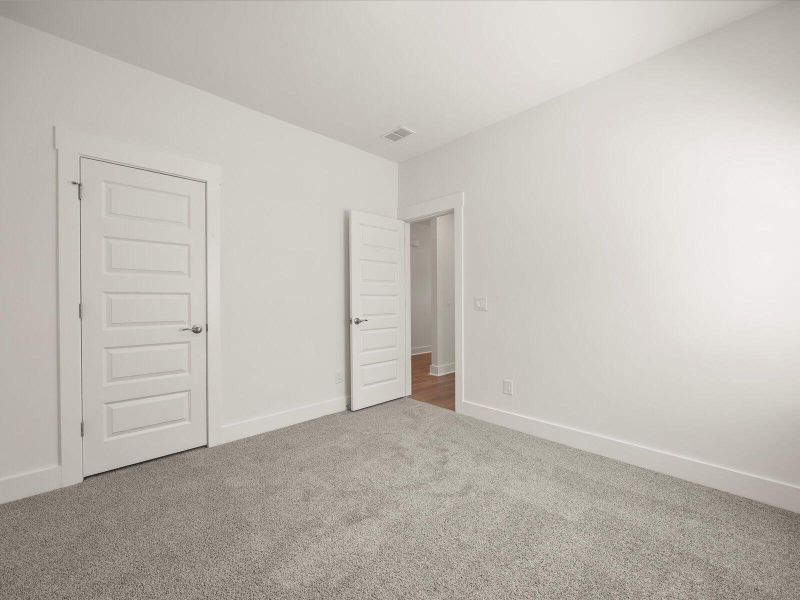Spacious, unfurnished interior of a new home in The Coves at Lakes of Cane Bay, Summerville (Image 39). Spacious, unfurnished interior of a new home in The Coves at Lakes of Cane Bay, Summerville (Image 39).