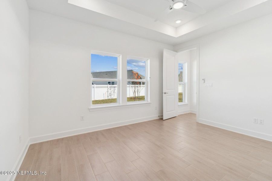 Spacious, unfurnished interior of a new home in Evergreen Island at Silverleaf - Classic, St. Augustine (Image 23).