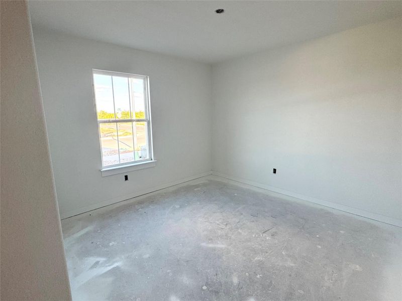 Unfurnished room with baseboards Unfurnished room with baseboards