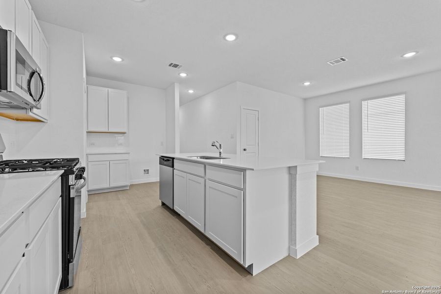 Furnished interior view inside a new home in , New Braunfels (Image 6).