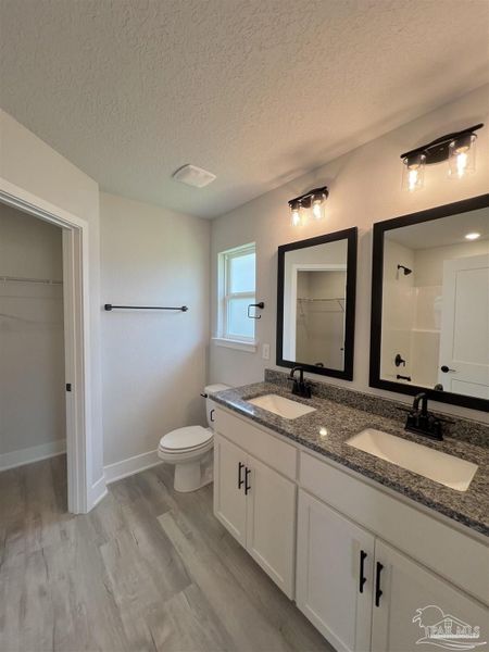 Furnished interior view inside a new home in Pine Top, Cantonment (Image 4).