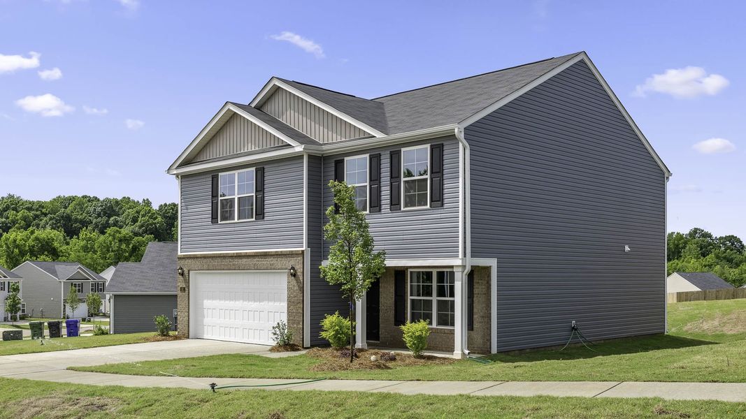Front exterior of a new home in Owens Ridge, Lexington, NC, highlighting curb appeal (Image 2). Front exterior of a new home in Owens Ridge, Lexington, NC, highlighting curb appeal (Image 2).