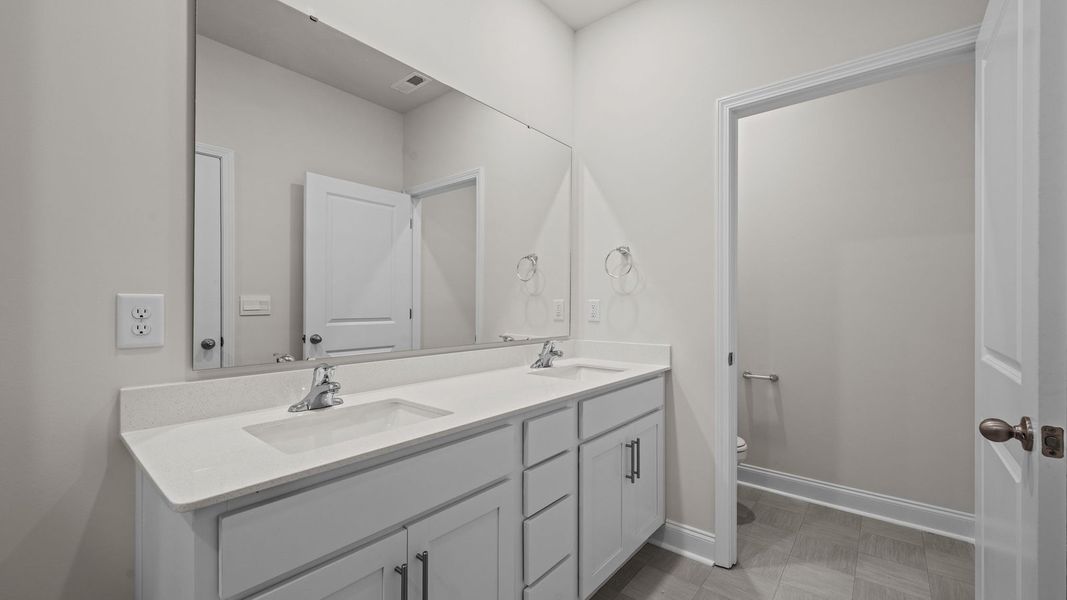 Furnished interior view inside a new home in Tyler - Home on the Lake, New Bern (Image 12).