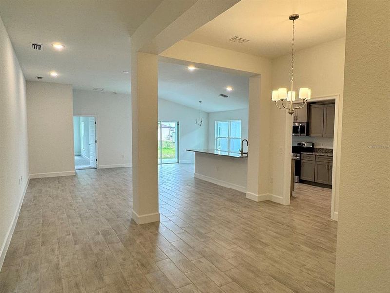 Spacious, unfurnished interior of a new home in Watercress Cove, North Port (Image 6).