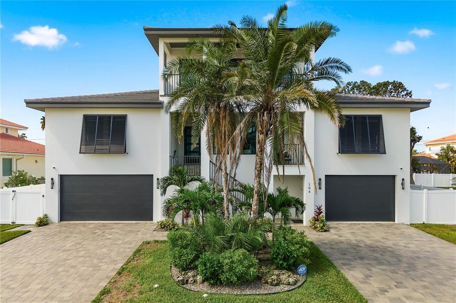 Front exterior of a new home in , Belleair Beach, FL, highlighting curb appeal (Image 25).