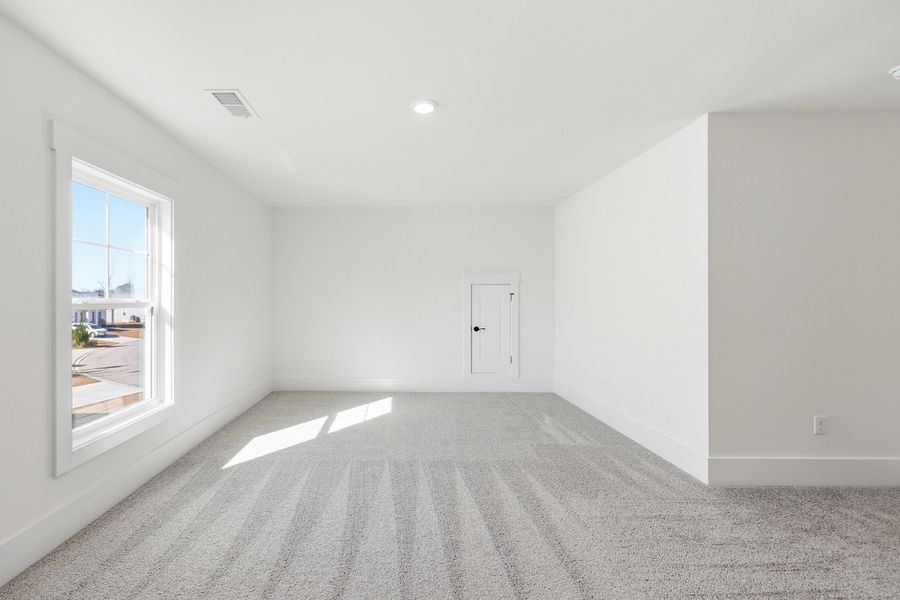 Representative unfurnished interior of a home built from the Montague II by Great Southern Homes in Oak Hollow, Longs (Image 35).