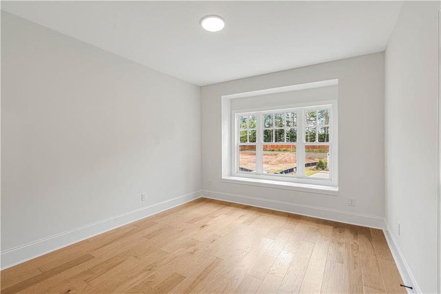 Spacious, unfurnished interior of a new home in Bellwyn, Johns Creek (Image 58).