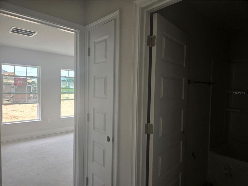 1st bedroom and shared bathroom