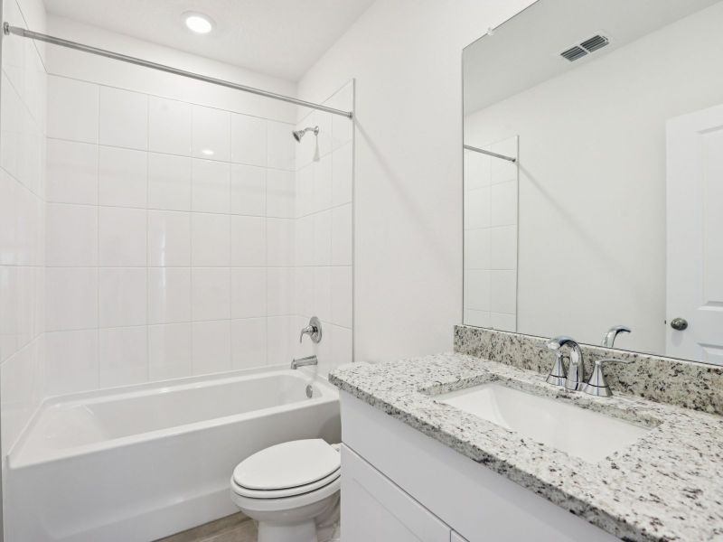 Furnished interior view inside a new home in Oakfield Trails - Premier Series, Parrish (Image 6).