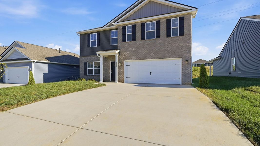 Front exterior of a new home in Fieldcrest Acres, Blountville, TN, highlighting curb appeal (Image 2).