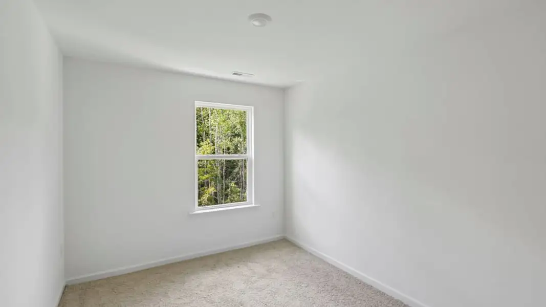 Spacious, unfurnished interior of a new home in The Townes at Belle Grove, Wendell (Image 17).