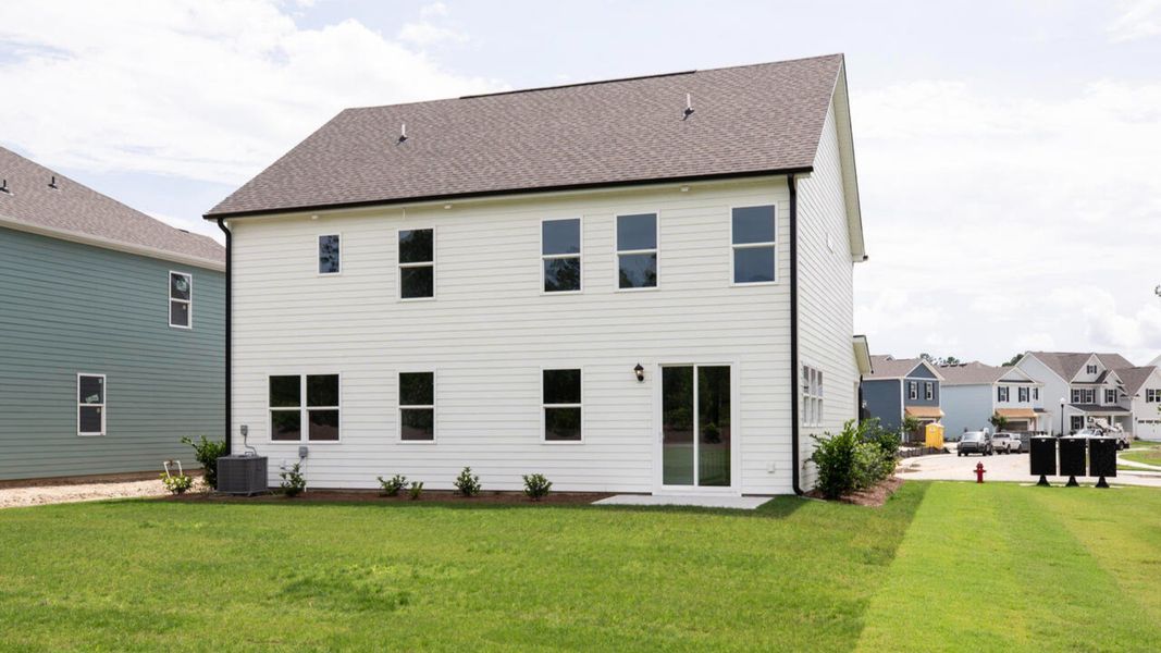 Exterior details and patio area of a home in Indigo Preserve, Leland (Image 2).