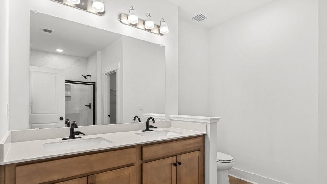 Furnished interior view inside a new home in Bluffs at Sun Colony, Longs (Image 15).